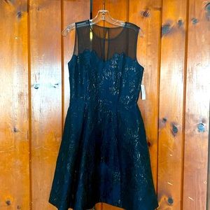 Black and blue formal dress sheer top fitted at the waist flared bottom